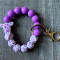 Purple Cow Print Silicone Key Chain Wristlet